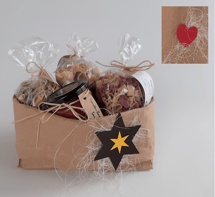 Papiertasche, heruntergefaltet, mit Herz- oder Sterndekoration - Kontaktaufnahme durch Rund ums Ei (CHF 3.70)